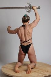 KAROLINA KNEELING WITH SWORD